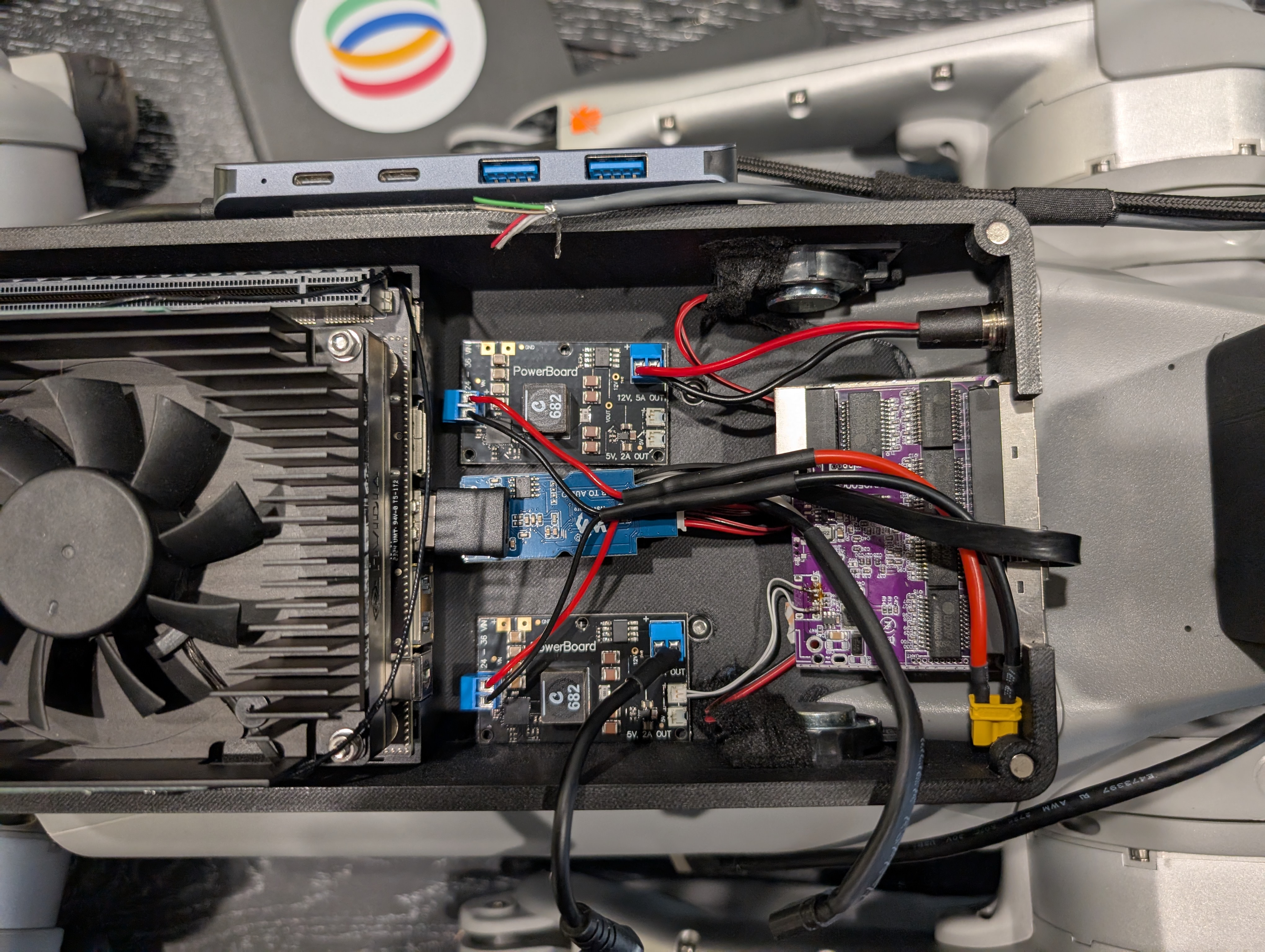 Internals of the unified hardware platform — custom PCBs and wiring